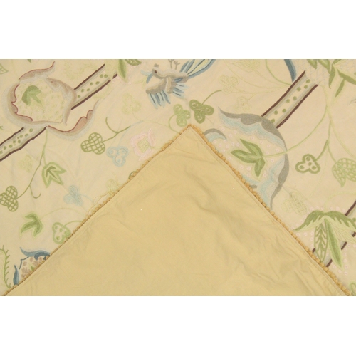 1005 - A FRENCH EMBROIDERED BEDSPREAD with birds amongst trees, silk trimmed border. 4ft 7ins x 4ft 7ins.... 