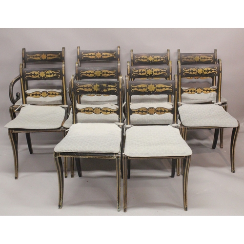 1021 - A SET OF TEN REGENCY BLACK JAPANNED AND GILDED DINING CHAIRS, 8 single and 2 carvers with canework s... 