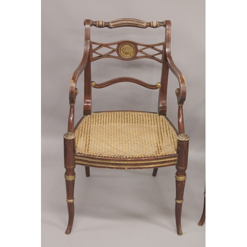 1022 - A GOOD PAIR OF REGENCY THOMAS HOPE DESIGN BLACK JAPANNED AND GILDED ARM CHAIRS with rope back, lion ... 