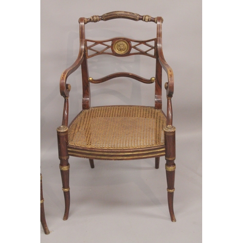 1022 - A GOOD PAIR OF REGENCY THOMAS HOPE DESIGN BLACK JAPANNED AND GILDED ARM CHAIRS with rope back, lion ... 