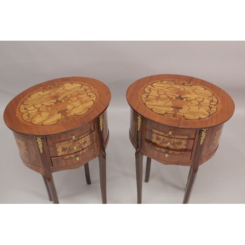 1027 - A GOOD PAIR OF LOUIS XVITH STYLE, INLAID OVAL SHAPED BEDSIDE CABINET with three drawers. 1ft 4ins wi... 