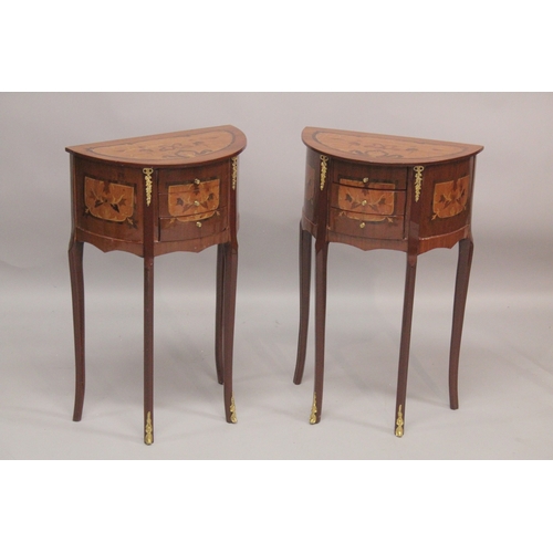 1028 - A GOOD PAIR OF LOUIS XVITH STYLE, INLAID HALF MOON  SHAPED BEDSIDE CABINET with three drawers. 1ft 6... 