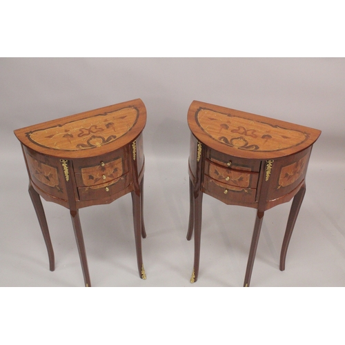 1028 - A GOOD PAIR OF LOUIS XVITH STYLE, INLAID HALF MOON  SHAPED BEDSIDE CABINET with three drawers. 1ft 6... 