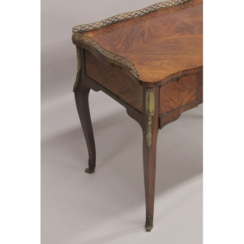 1033 - AGOOD 19TH CENTURY FRENCH KINGWOOD PADROUSE with brass galley and quartered top, three freize drawer... 