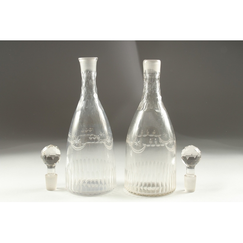 1041 - A PAIR OF GEORGIAN ENGRAVED DECANTER AND STOPPER.