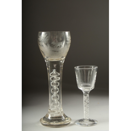 1050A - A LARGE OPAQUE TWIST WINE GLASS, the bowl engraved with a sporting dog .9ins high and a small wine g... 