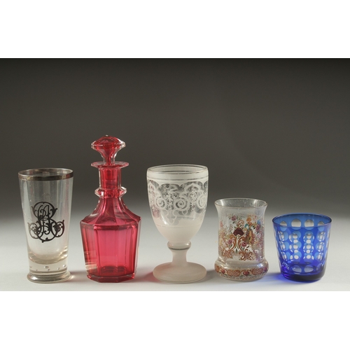 1050D - A SMALL RUBY DECANTER AND STOPPER, silver overlay beaker, a knop beaker and a blue and white beaker ... 