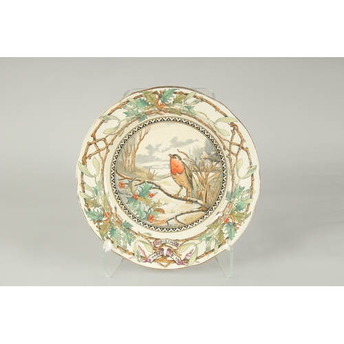 1063 - A LONGTON STAFFORDSHIRE CHRISTMAS PLATE.  The centre with a robin. 12ins diameter.