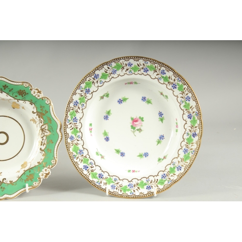 1071 - A PAIR OF CORNFLOWER PATTERN PLATES and a GILT PLATE (3).