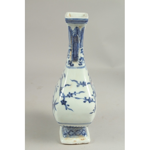 1090 - A CHINESE BLUE AND WHITE TWO HANDLED VASE.  11ins high.