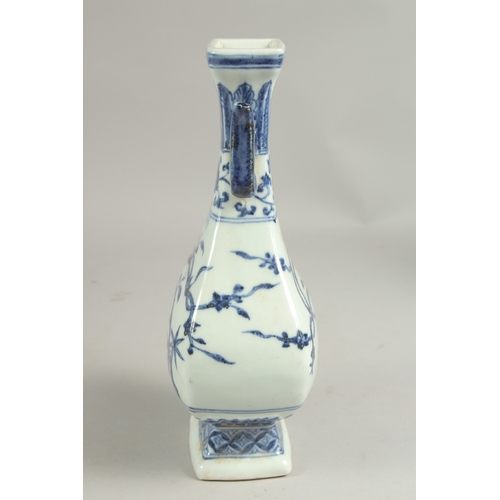 1090 - A CHINESE BLUE AND WHITE TWO HANDLED VASE.  11ins high.