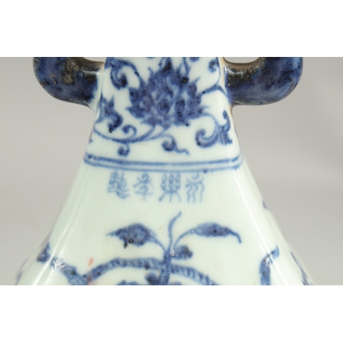 1090 - A CHINESE BLUE AND WHITE TWO HANDLED VASE.  11ins high.