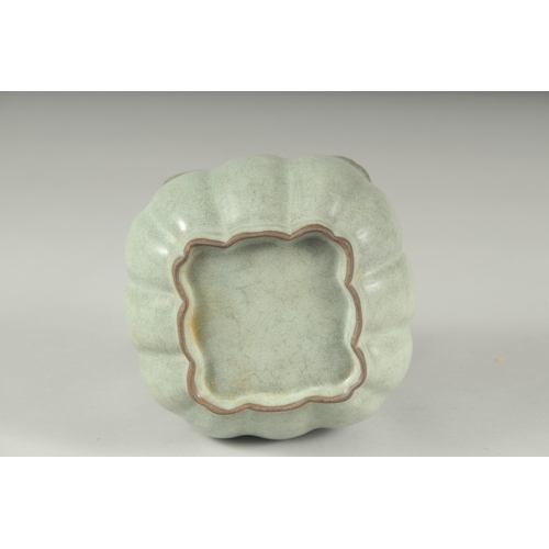 1092 - A CHINESE SQUARE PORCELAIN BOWL.  4.5ins.