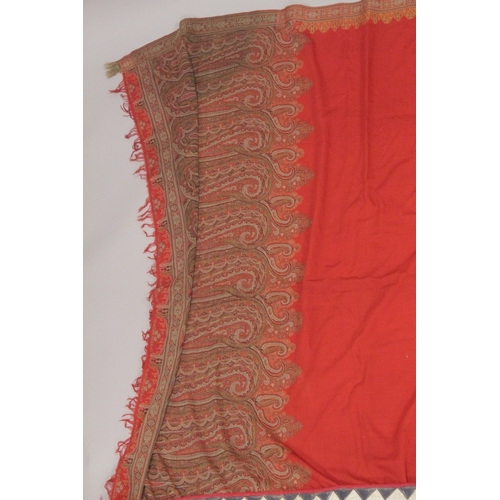 1152 - A PAISLEY SHAWL AND AN INDIAN TEXTILE.