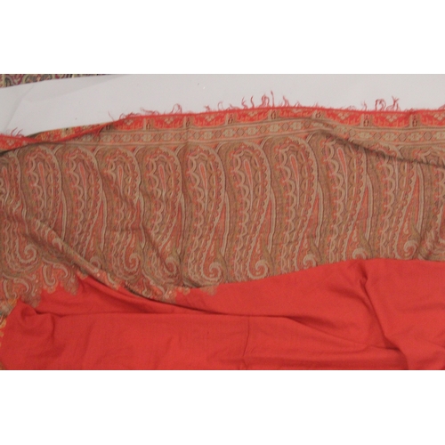 1152 - A PAISLEY SHAWL AND AN INDIAN TEXTILE.