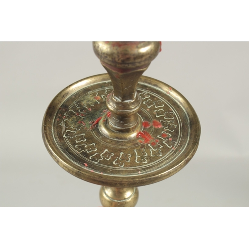 1157 - A CLASSICAL BRONZE HEXAGONAL CANDLESTICK. 15.5ins high.