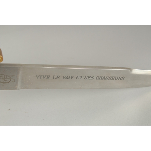 1176 - A GERMAN KNIFE with engraved, 8.5ins blade. VIVE LE ROX ET SES CHASSEURS with bone handle, in a leat... 