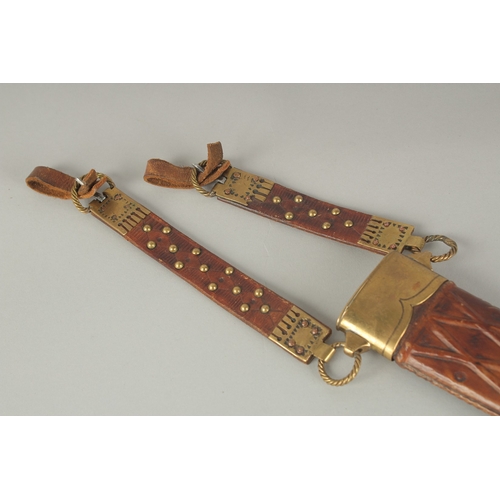 1177 - A GERMAN KNIFE with 13ins blade and bone handle, in a leather sheath.