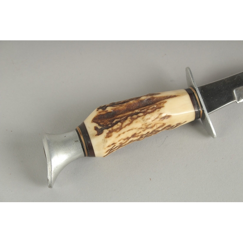 1178 - A SOLINGER GERMAN KNIFE with 4.5ins blade and bone handle, in a leather sheath.