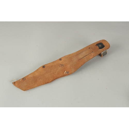 1178 - A SOLINGER GERMAN KNIFE with 4.5ins blade and bone handle, in a leather sheath.