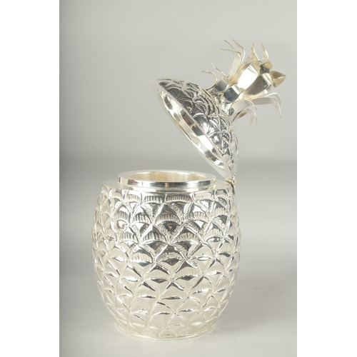 1203 - A PINEAPPLE ICE BUCKET with hinged lid. 13ins high.