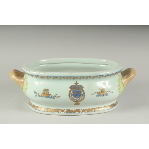 1237 - A TWO HANDLED ARMORIAL FOOT BATH.  15ins long.