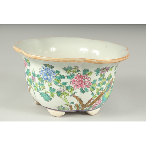 1238 - A BOWL PAINTED WITH BIRDS AND FLOWERS.  9ins diameter.