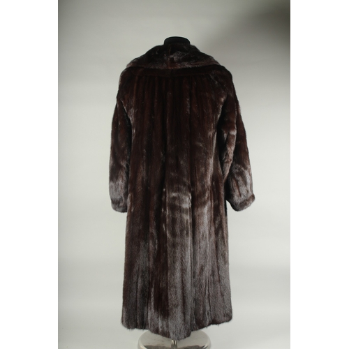 1242 - A LADIES FULL LENGTH MINK FUR COAT.  CHARLES MOSS FURS. Cost £6000 new.