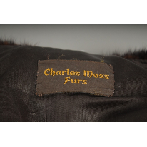 1242 - A LADIES FULL LENGTH MINK FUR COAT.  CHARLES MOSS FURS. Cost £6000 new.