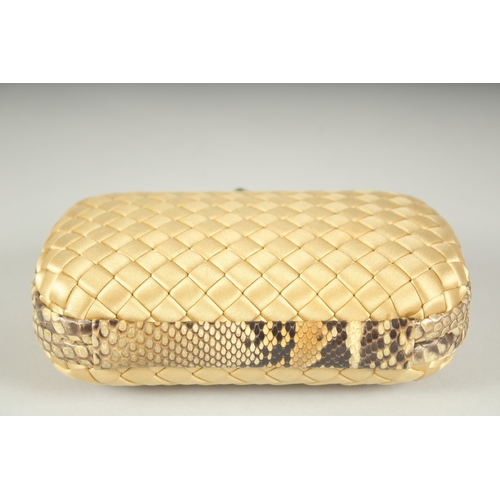 1250 - BOTTEGA VENETO. A GOLD WOVEN CLUTCH BAG.  6.5ins long.