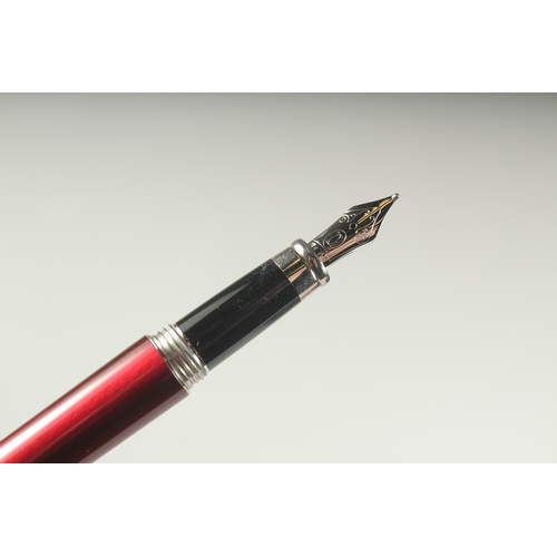 1260 - A CARTIER FOUNTAIN PEN. 18ct gold nib with four ink refills in a Cartier case.