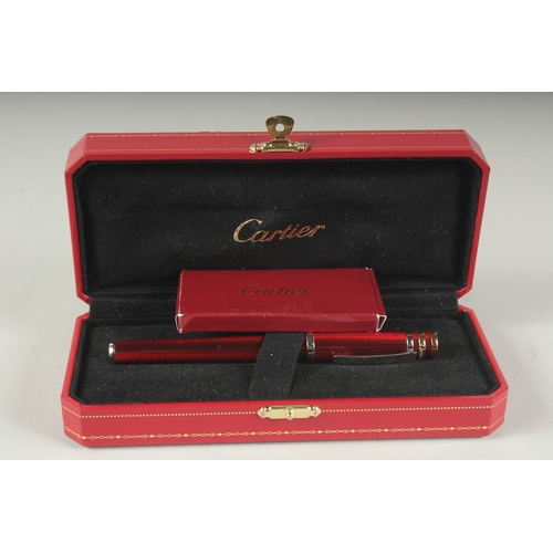 1260 - A CARTIER FOUNTAIN PEN. 18ct gold nib with four ink refills in a Cartier case.