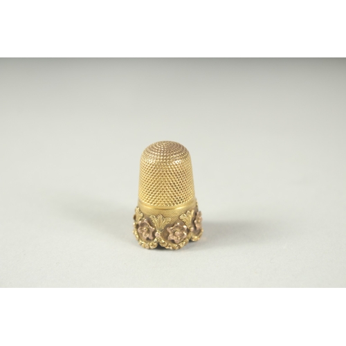 1262 - AN 18CT GOLD PRITTY THIMBLE.