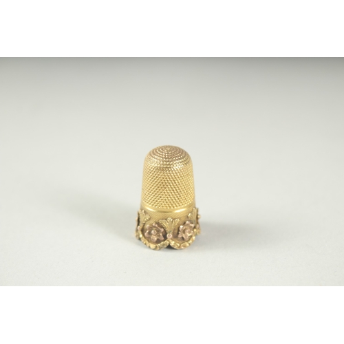 1262 - AN 18CT GOLD PRITTY THIMBLE.