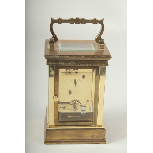 1267 - A GOOD BRASS CARRIAGE CLOCK.