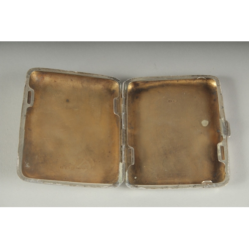 1276 - A PLAIN SILVER CIGARETTE CASE. Birmingham, 1925, 68gms with an enamel oval of a nude.