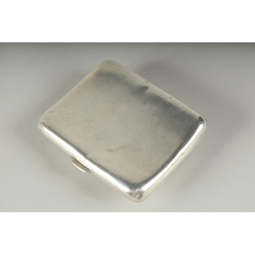 1276 - A PLAIN SILVER CIGARETTE CASE. Birmingham, 1925, 68gms with an enamel oval of a nude.