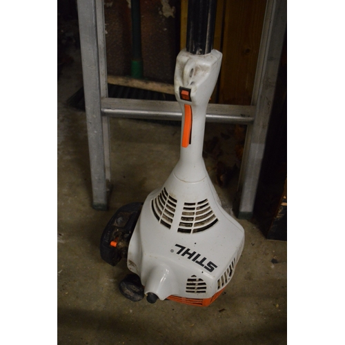 165 - A Stihl petrol brush cutter.