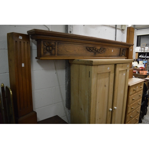 193 - An oak fire surround (opening size approx 125cm wide x 98cm high).