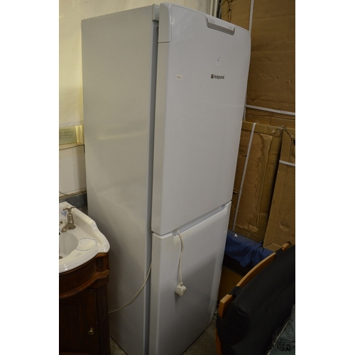 204 - A Hotpoint upright fridge freezer.