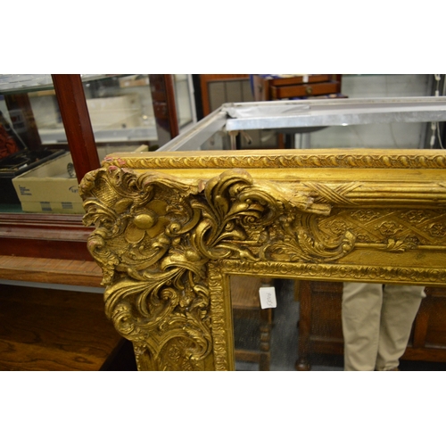 257 - A good large modern decorative gilt framed mirror.