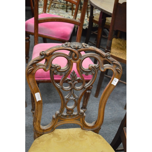 278 - A good Victorian carved walnut chair with cabriole legs together with a pair of other dining chairs.