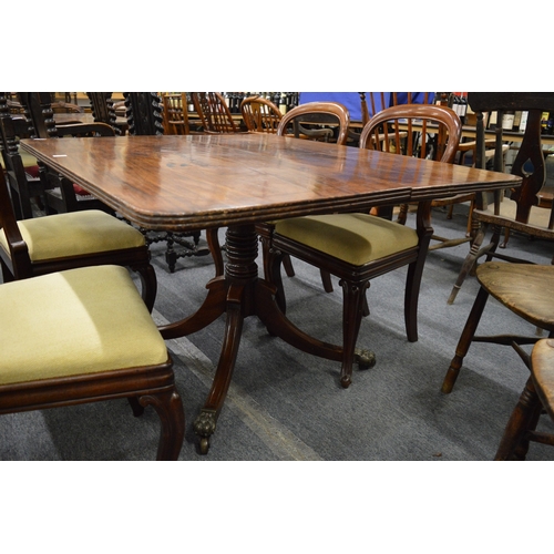 281 - A 19th century mahogany tilt-top breakfast table with rounded rectangular top, turned column support... 