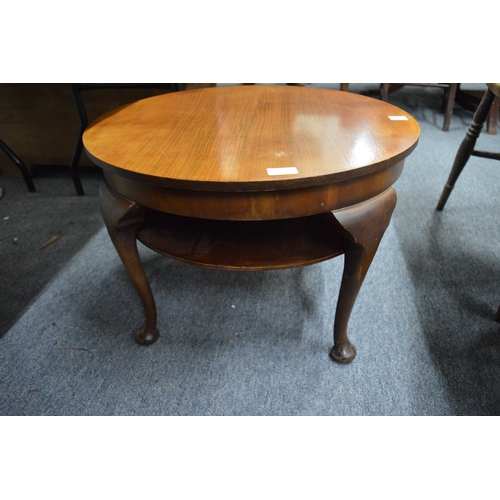 293 - Two circular walnut coffee tables.