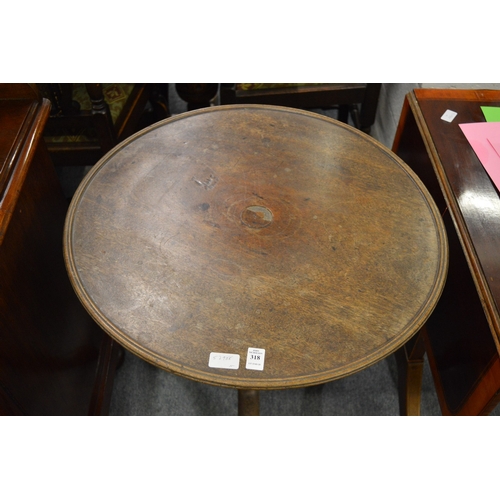 318 - A mahogany circular tripod table.