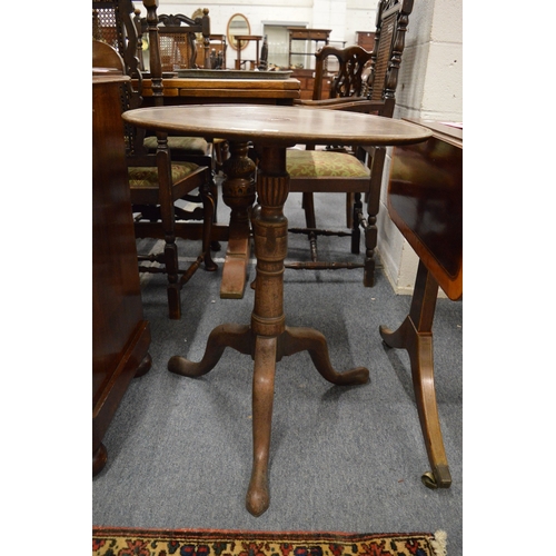 318 - A mahogany circular tripod table.