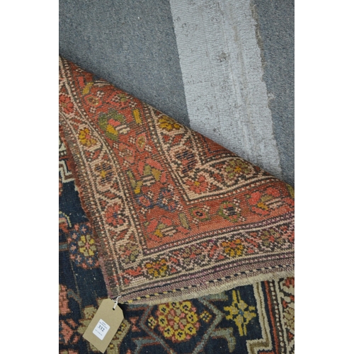 332 - Early Persian runner, blue ground with stylised decoration, signed, 406cm x 112cm.