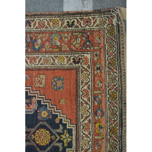 332 - Early Persian runner, blue ground with stylised decoration, signed, 406cm x 112cm.