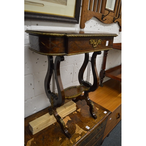 366 - A French parquetry decorated and ormolu mounted work table with lyre end supports (faults).