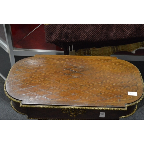 366 - A French parquetry decorated and ormolu mounted work table with lyre end supports (faults).